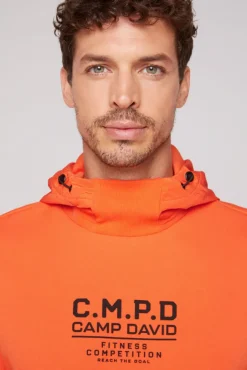 Herren CAMP DAVID & SOCCX Hoodie im Materialmix mit Artwork und Rückentasche signal orange